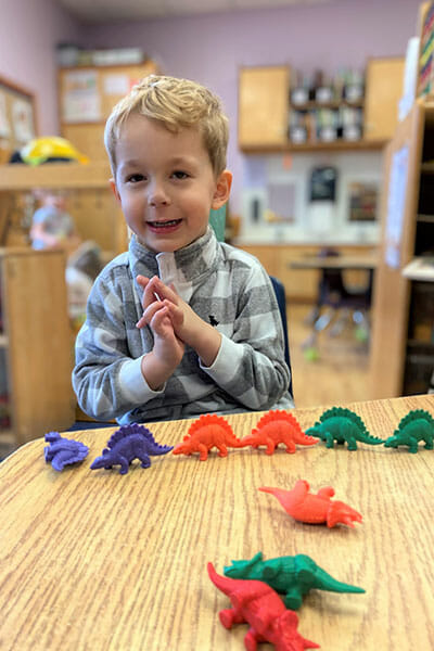 Learning Paths Academy, Preschool Readiness Enrichment Program (PREP), Little boy playing with dinosaurs